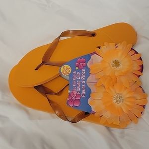 Orange flip flops , w/ clip on flowers,  size 11 NWT